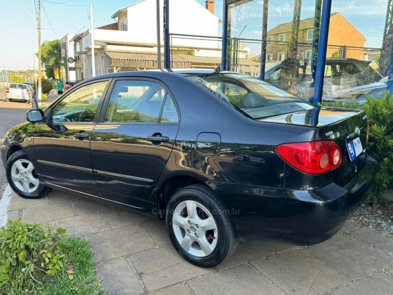 TOYOTA - COROLLA - 2004/2005 - Preta - R$ 33.900,00