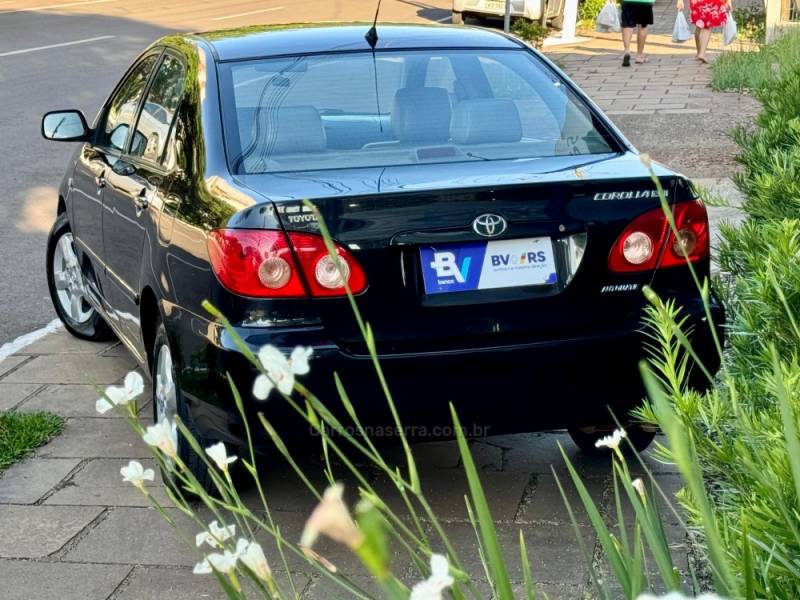 TOYOTA - COROLLA - 2004/2005 - Preta - R$ 33.900,00