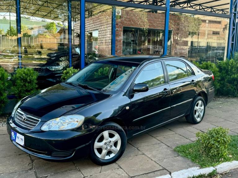 TOYOTA - COROLLA - 2004/2005 - Preta - R$ 33.900,00